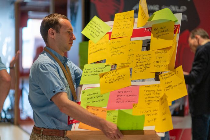 Board full of notes being lifted